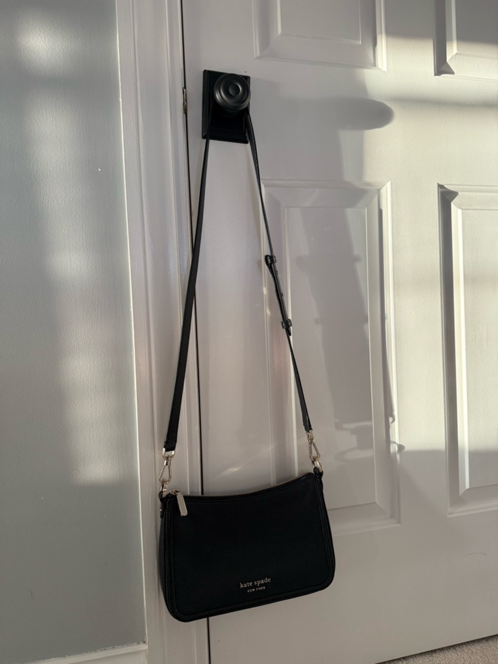 kate spade black crossbody with gold-tone hardware